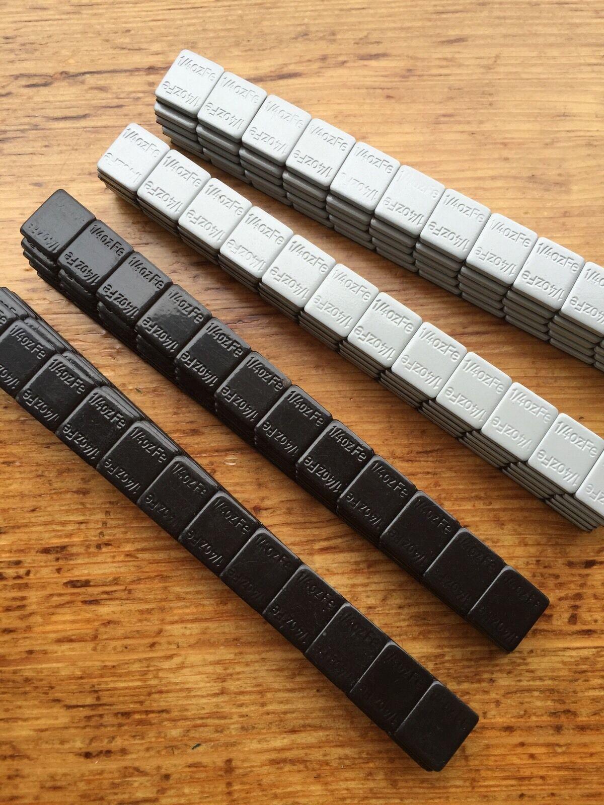 27 LBS BLACK WHEEL WEIGHTS-1/4 OZ -27 LBS GREY- 1/4 OZ. STICK-ON ADHESIVE TAPE